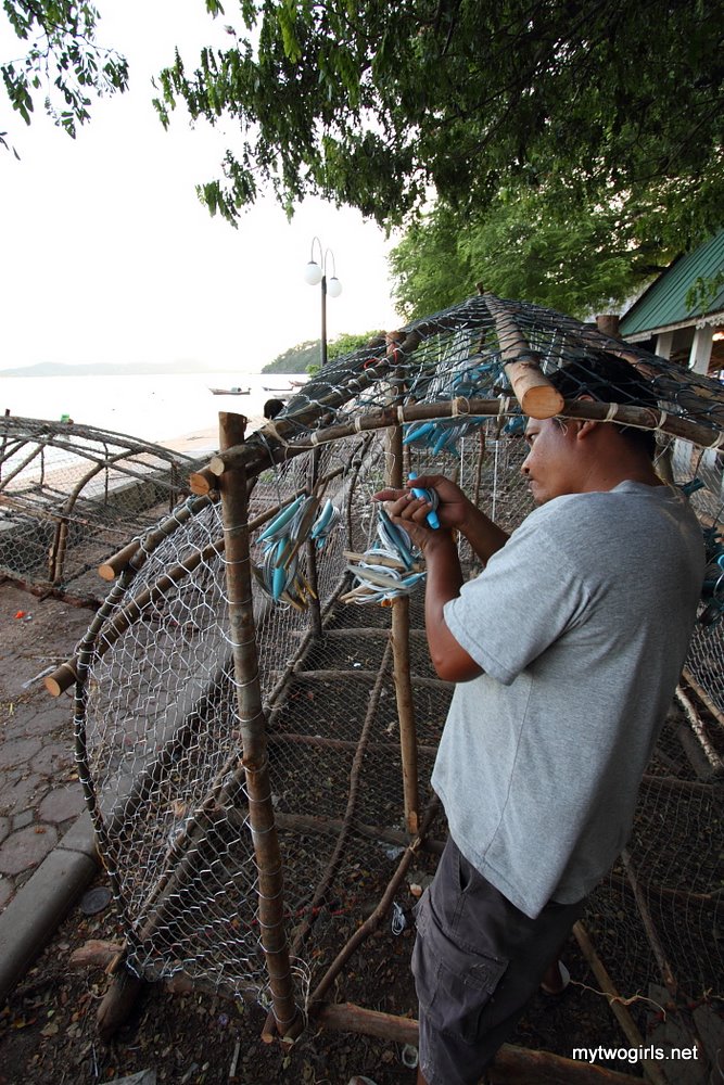 Gypsy man making fish cage